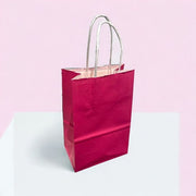 Paperikassi. Korkeus 21 cm. Vaaleanpunainen. 50 kpl.