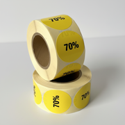 Keltainen alennustarra 70%. Rulla 500 kpl. Ø 30 mm.