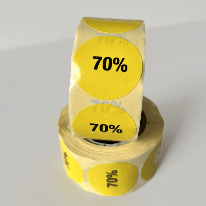 Keltainen alennustarra 70%. Rulla 500 kpl. Ø 30 mm.