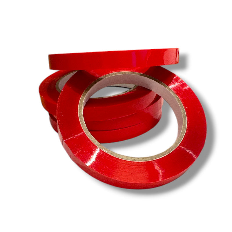 Pakkauskoneen teippi punainen, 12 rullaa. Hinta näkyy /kpl.