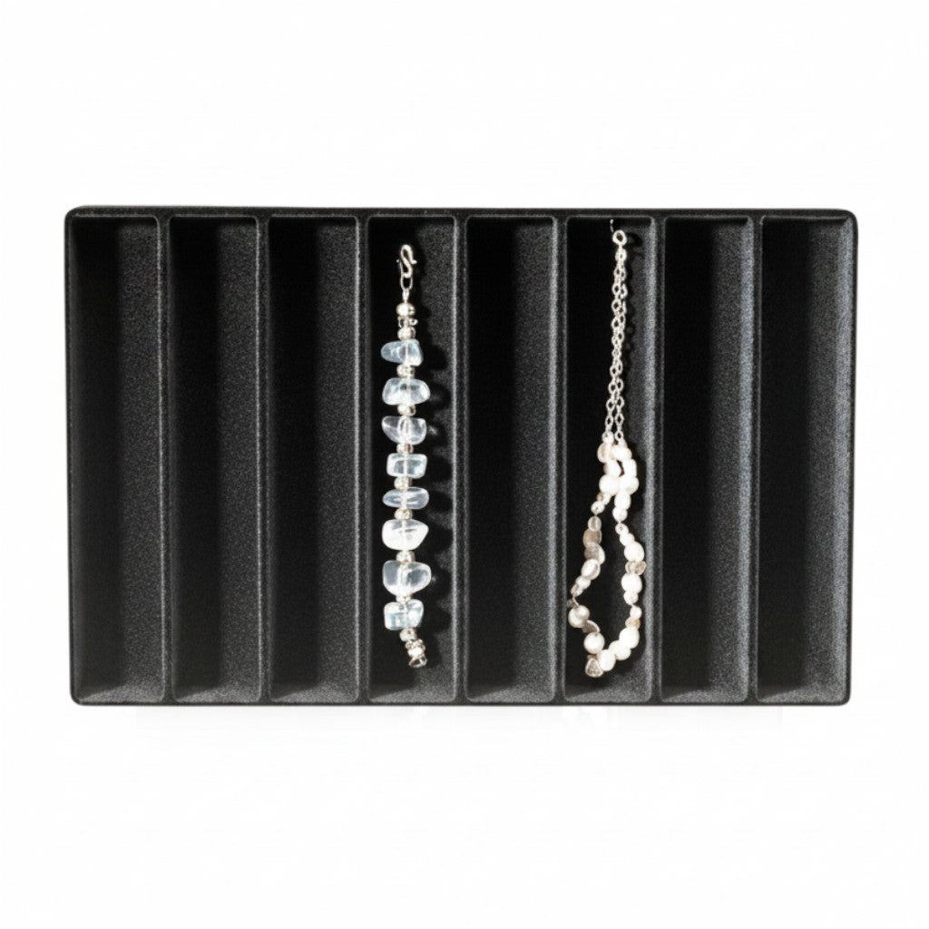SuperSellerS black jewelry display tray with eight long compartments holding two delicate necklaces