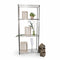 SuperSellerS TUBO chrome wire shelving unit with four tiers, styled with wooden crates and decorative plants.