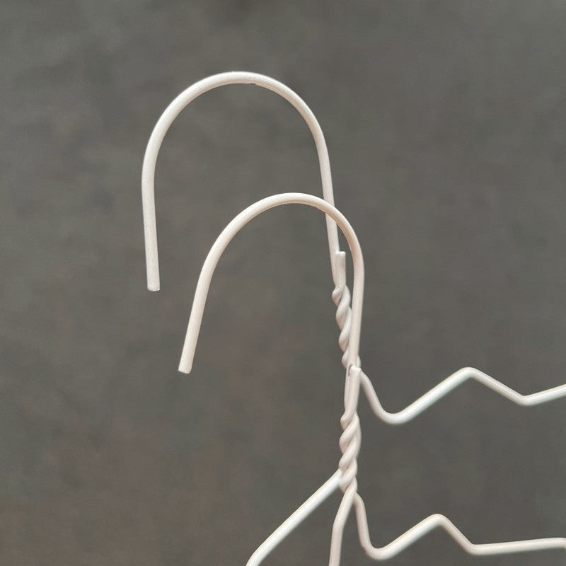 SuperSellerS white powder-coated wire clothes hanger for children with a twisted metal hook design